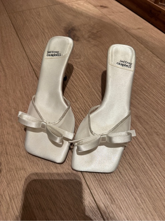 Jeffrey Campbell Shoes - Jeffrey Campbell Ivory Satin Bow Slide Mules